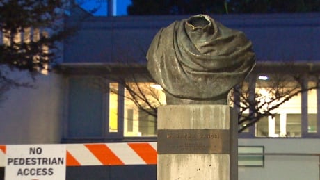 Decapitated Gandhi statue