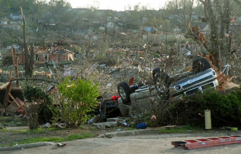 A car is turned upside down.