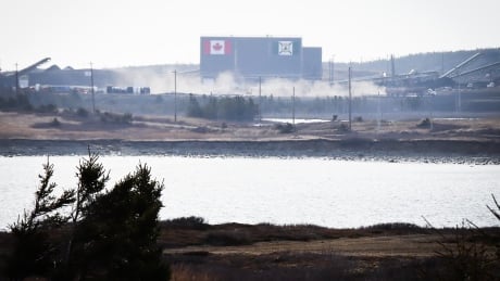 Coal trucks continue to take product from the Donkin coal mine Monday May despite a fire in the mine last night.