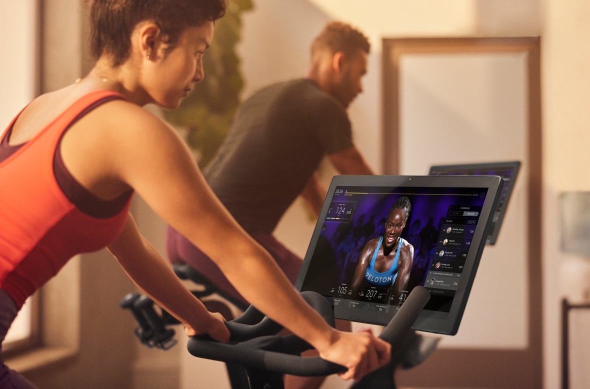 A rider on a commercially-certified Peloton bike.