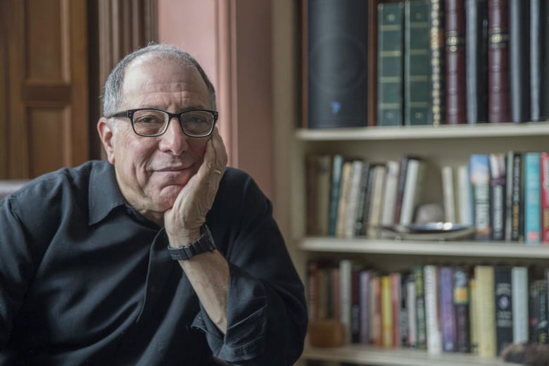 In this Saturday, March 10, 2018 photo, Michael Kimmel poses at his home in New York. Kimmel is a leader in what's known as "masculinities studies," and an in-demand purveyor of insight on why men are the way they are. The field he helped develop has long had men's misdeeds as an area of focus, but it's gained newfound exposure and relevance with #MeToo and #TimesUp. (AP Photo/Mary Altaffer)