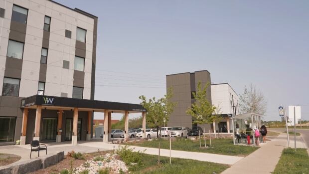 'Having a place to live is freedom': Families move into YW's newest affordable housing building