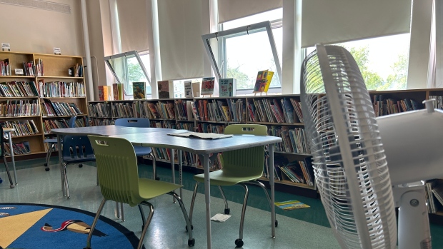 Extreme heat spells early dismissal for some N.B. students Thursday; Nelia Husack, principal of Victoria-Albert elementary school in central Winnipeg, says it's difficult for her nearly 300 students to learn when they're hot\. It was 30 degrees Celsius inside of the school on Tuesday\.