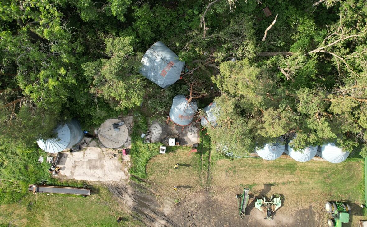 A bird's eye view of damaged grain silos from a tornado.