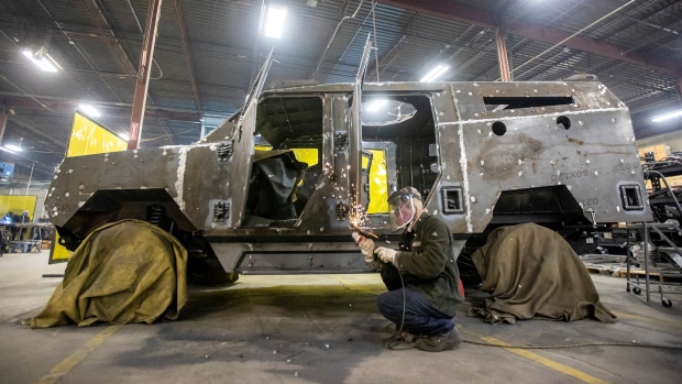 Donated Canadian-built armoured vehicles break down often, Ukrainian commander says; A welder works on the Senator APC at vehicle manufacturer Roshel after Canada's defence minister announced the supply of 200 Senator armoured personnel carriers to Ukraine, as part of a new package of military assistance, in Mississauga, Ontario, Canada January 19, 2023\.  REUTERS/Carlos Osorio