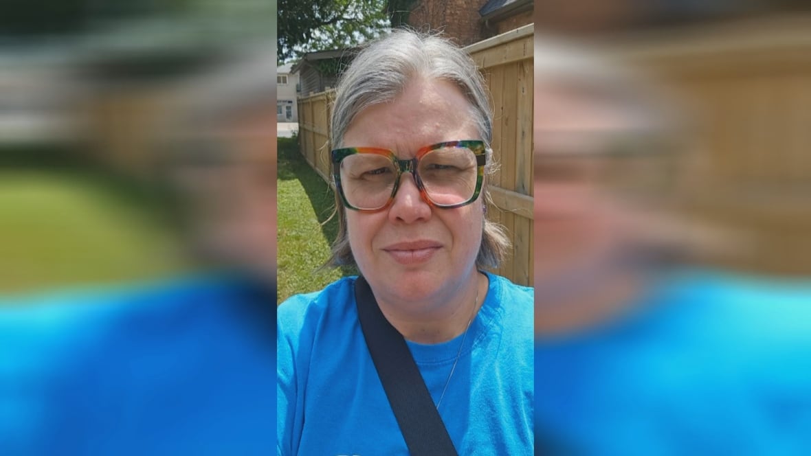 Renee Geniole wearing a light blue shirt