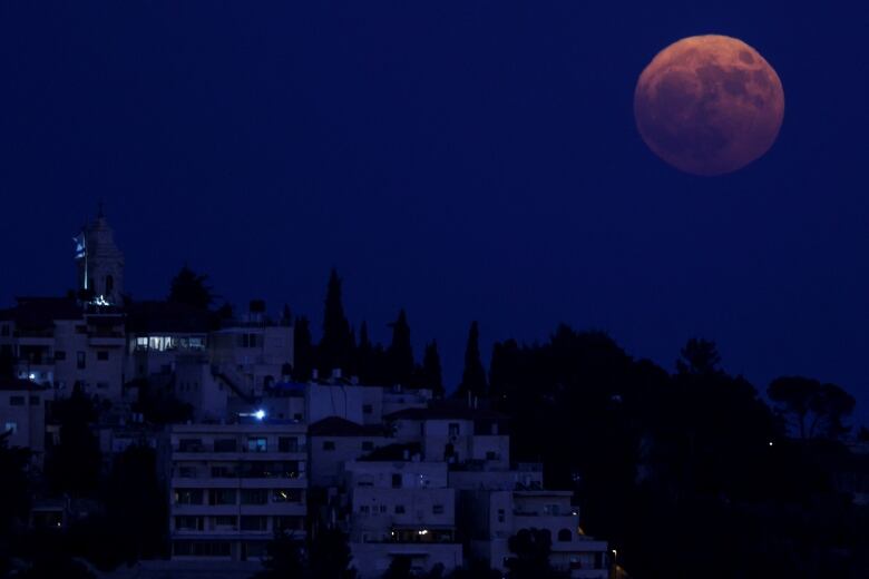 Full moon in the sky above Jerusalem.