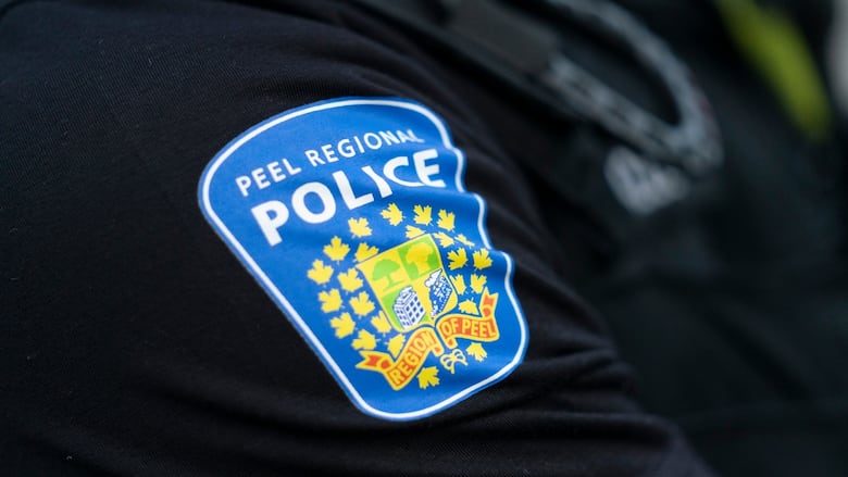 Close up of a a Peel Regional Police shoulder patch on a police uniform