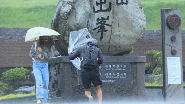 Tropical storm Khanun blowing into South Korea after battering Japan for a week