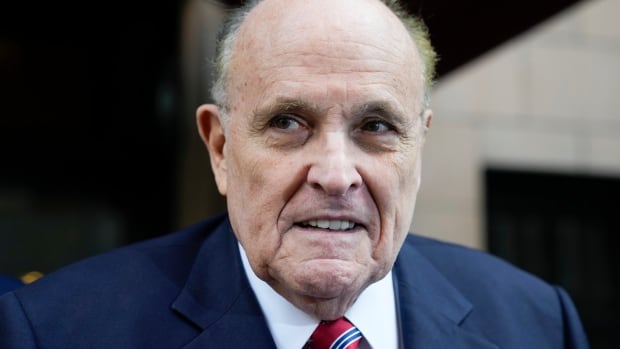 Former Trump lawyer Rudy Giuliani surrenders in Georgia election case