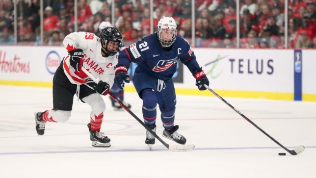 Toronto, Montreal, Ottawa announced as franchises in newly named Professional Women's Hockey League; Canada's Marie-Philip Poulin, left, battles for the puck against American forward Hilary Knight, right, during the gold-medal game of the 2023 world championship in April\. Poulin and Knight are two PWHPA players who could be part of the newly formed Professional Women's Hockey League, which introduced its first six franchises on Tuesday\.