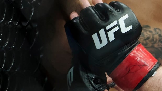  The UFC logo is shown on a fighters hand during UFC Fight Night at Rogers Arena in Vancouver, Saturday, September, 14, 2019. 