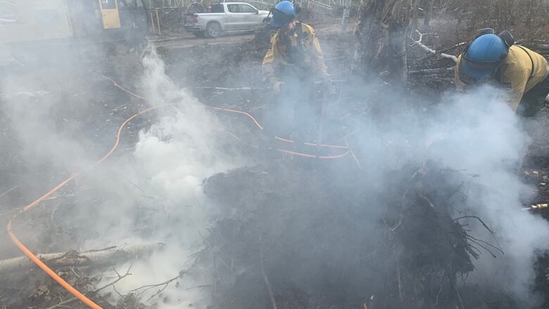 Smoke and firefighters.