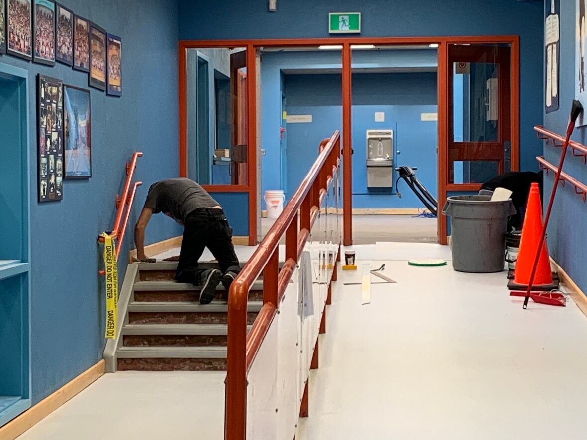 https://i.cbc.ca/1.6964955.1694572970!/fileImage/httpImage/image.JPG_gen/derivatives/original_1180/flooring-work.JPG