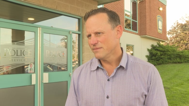 Darren MacDougall standing out front of the Charlottetown police station. 