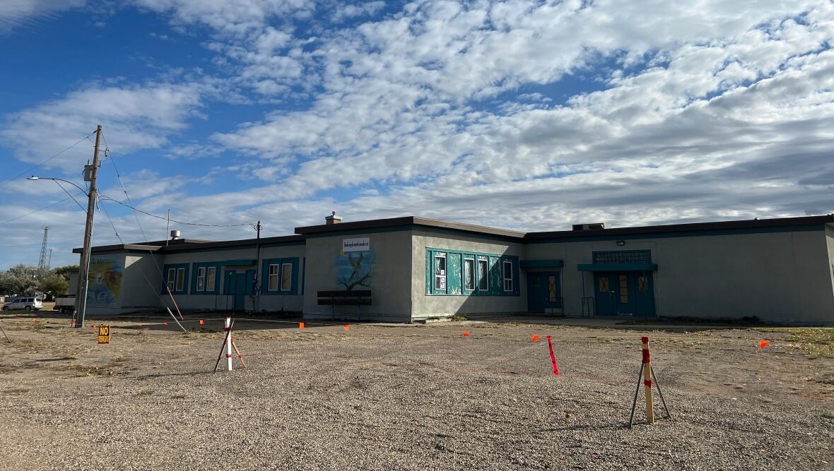 a school surrounded by orange barrriers