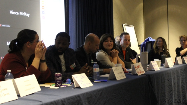 Settler history and Indigenous relationships: A look at FOXY's N.W.T. all-candidates debate; A little more than a third of the candidates in the N\.W\.T\.'s 2023 territorial election participated in a debate at the Explorer Hotel on Monday evening\. Visible from left to right are Kate Reid, Ambe Chenemu, Robert Hawkins, Stacie Arden Smith, Keiron Testart, Nicole Sok and Katrina Nokleby\.