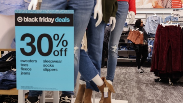 Shoppers more cost conscious than ever as Black Friday kicks off holiday spending season; A Black Friday sign at a Target store ahead of Black Friday in Smyrna, Georgia, US, on Tuesday, Nov\. 21, 2023\. An estimated 182 million people are planning to shop from Thanksgiving Day through Cyber Monday, the most since 2017, according to the National Retail Federation\. Photographer: Elijah Nouvelage/Bloomberg