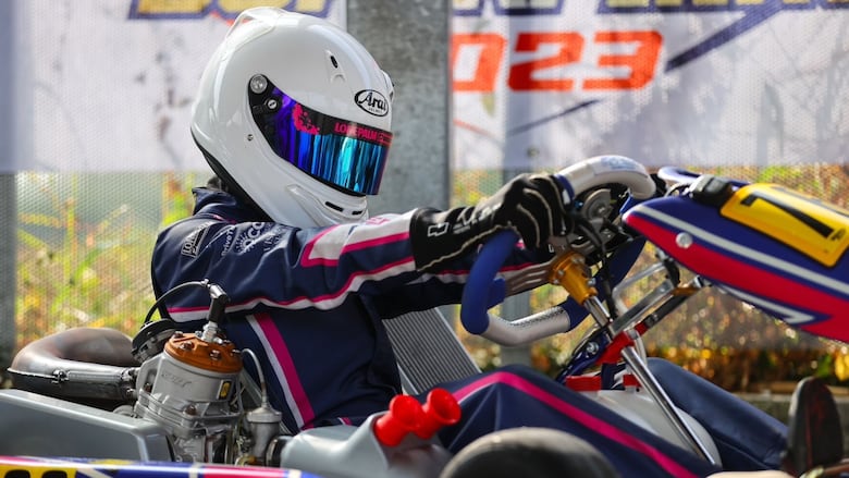 Teen in a go-kart.