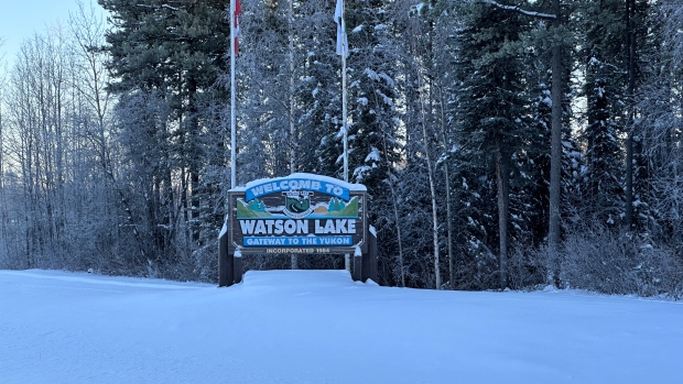 Some Watson Lake residents don't want to see their electoral boundaries changed; A sign welcomes people to Watson Lake, Yukon, on a snowy winter's day\.