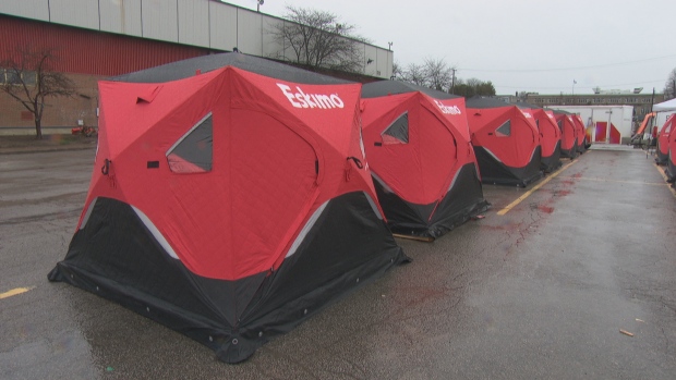 Developer sets up heated tents in Gatineau parking lot to shelter homeless; Some of the 28 tents set up by Devcore in front of Robert Guertin Centre arena\.