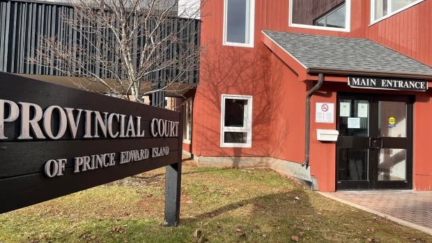 Provincial court of P.E.I. in Charlottetown. A sign reading Provincial Court of Prince Edward Island stands next to an entryway into the building.