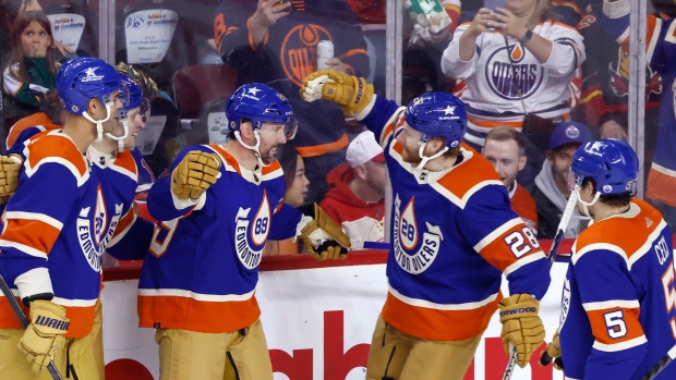 Oilers douse Flames to set record for longest win streak by Canadian team; Edmonton Oilers' Sam Gagner, centre, celebrates his goal with teammates during third period NHL hockey action against the Calgary Flames on Saturday, Jan\. 20, 2024\. 
