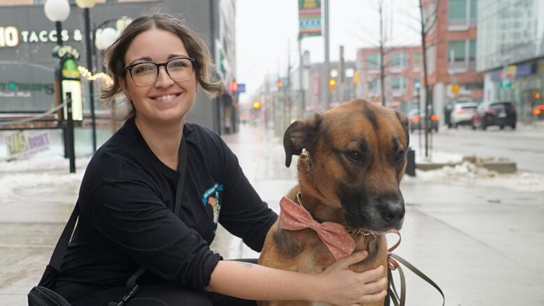 photo of a woman and her dog
