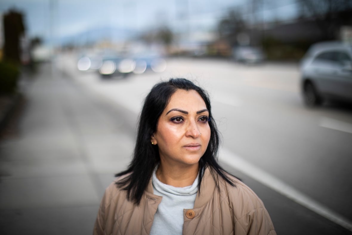Neera Agnihotri of Agnihotri Immigration Consulting Inc. in Surrey, British Columbia, on Monday, Jan. 29, 2024. She is a South Asian woman standing near a road.