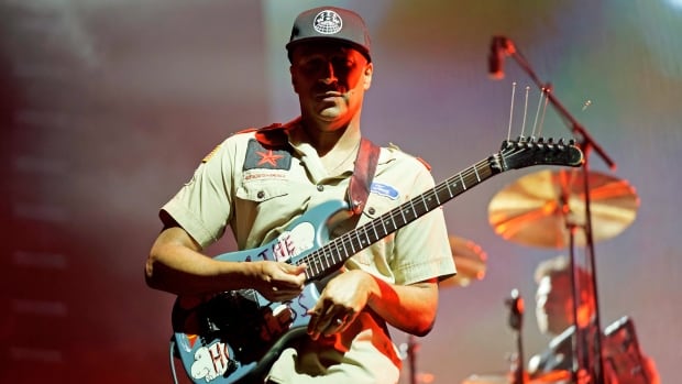 Rock legend Tom Morello performs at human rights museum for opening of new exhibit