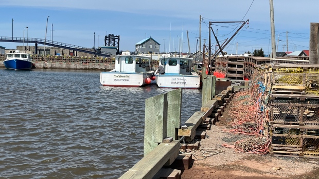 Coastal erosion's effect on fishermen, ferry a concern in eastern P.E.I.; Boats in a harbour\.