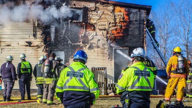 2 people in hospital after house fire near Wolfville; Fire crews and paramedics attend the scene at the fire on Newtonville Road on April 8, 2024\.
