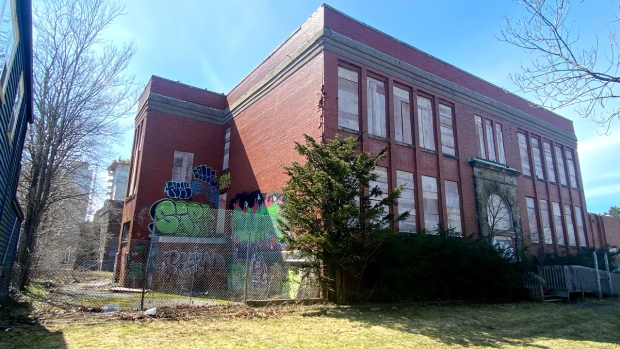 Parts of Bloomfield site in Halifax collapsing, unsafe to enter, says report; One of the two oldest buildings on the Bloomfield site in Halifax, facing Agricola Street\. A structural assessment says this building has a partial roof collapse and issues with load-bearing brick walls\. 