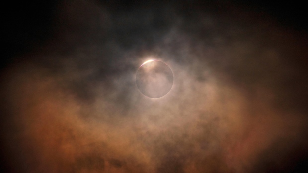 Brighter than creation's dark in this week's photo gallery; Newfoundland's typically overcast weather made for tricky eclipse watching, but Christian snapped this shot during a brief break in the clouds over Terra Nova\.