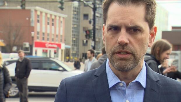 Tim Yerxa, Fredericton Playhouse executive director, said residents will see the steel and concrete structure going up in the fall. A man wearing a blue shirt and blazer