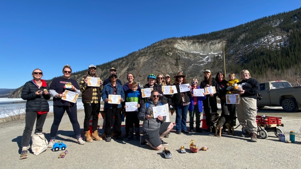 Winner of Dawson City, Yukon's 1st potato race takes home trophy and bragging rights; A group of people who race potatoes for the Dawson City, Yukon potato race\. Only one was crowned champion but everyone left feeling like winners\.