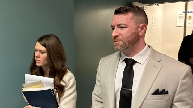 Judge throws out charges against pair accused of harassing N.S. chief medical officer; Jeremy MacKenzie, right, and Morgan Guptill are shown on Tuesday, April 30, 2024, outside a provincial courtroom in Dartmouth, N\.S\.