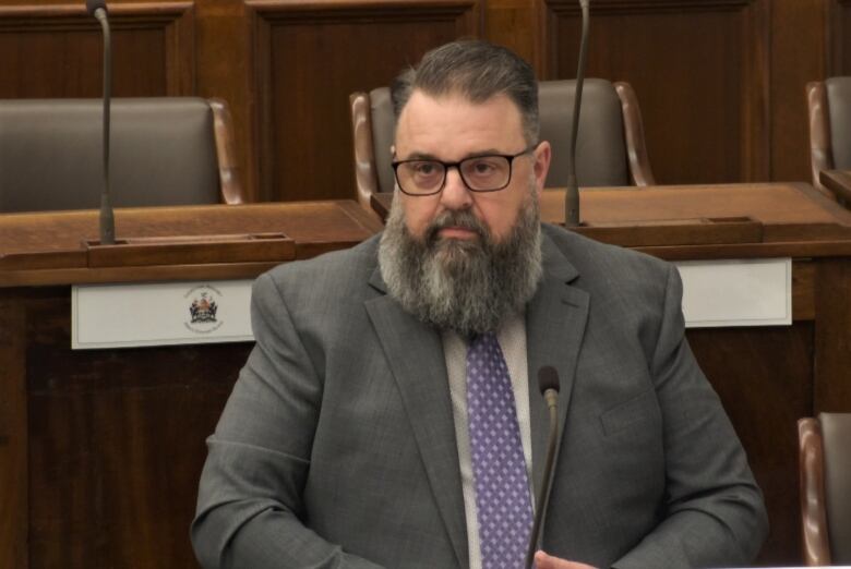 Hal Perry seated in the P.E.I. Legislature