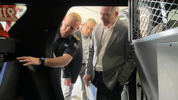 New plan for P.E.I.'s paramedics should keep more Islanders out of the ER; Island EMS general manager James Orchard, left, shows off one of the company's new Community Paramedic Response Units to P\.E\.I\.'s director of director of emergency health services Scott Cameron, centre, and Health Minister Mark McLane\.