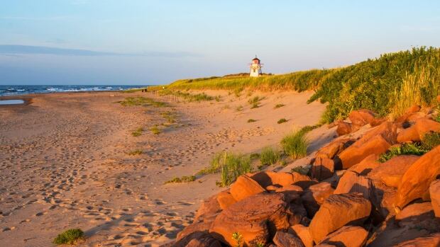A photo of a beach in Prince Edward Island submitted by the Tourism Industry Association of Prince Edward Island. A beach at sunset