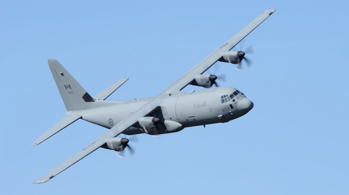 A CC-130J Hercules tactical airlifter in flight.