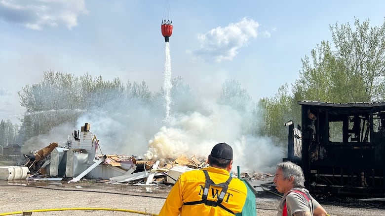 water tank dropped on burned down building