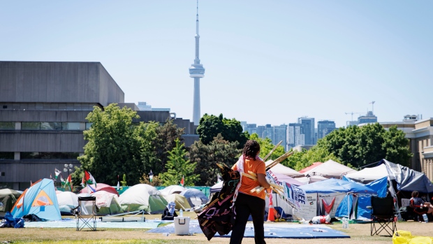 U of T site more like public park than private property: protesters; Occupants of a pro-Palestinian encampment on the main campus of the University of Toronto relocate tents on May 24, 2024\.