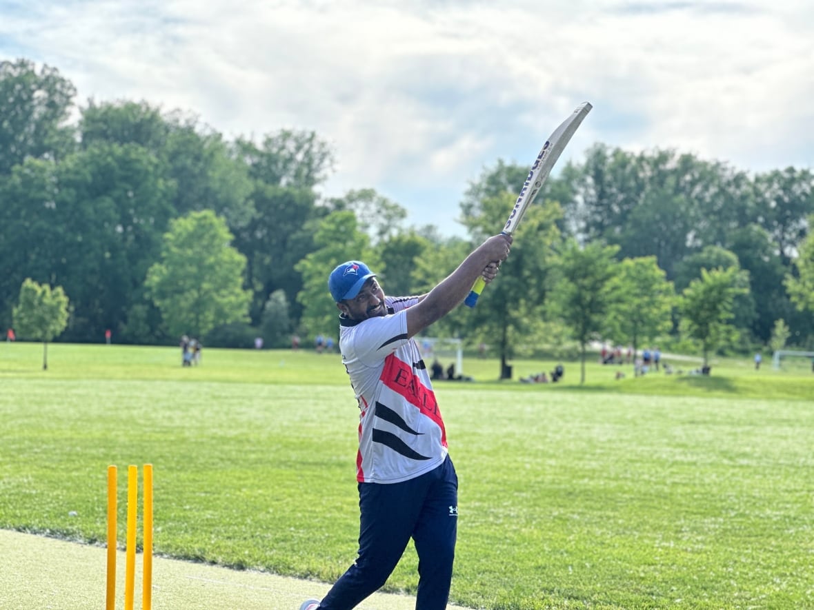 London Eagles Cricket Club trains on the pitch at North London Athletic Field twice a week. Batsman Nikunj Rathod practices at one of the games.