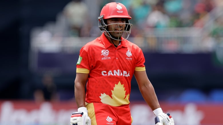 Canadian male cricket player reacts as he walks off the field after losing his wicket during the ICC Men's T20 World Cup cricket match between Pakistan and Canada at the Nassau County International Cricket Stadium in Westbury, New York, Tuesday, June 11, 2024.