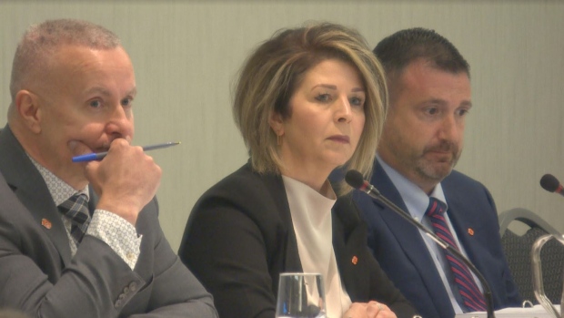 Proposed N.B. Power rate increase hits wall of opposition during final arguments; N\.B\. Power's Chief Financial Officer Darren Murphy \(left\) told the utility's rate hearing the company should be allowed to keep unbudgeted revenues that have turned up at its rate hearing rather than reduce its rate increases\. 