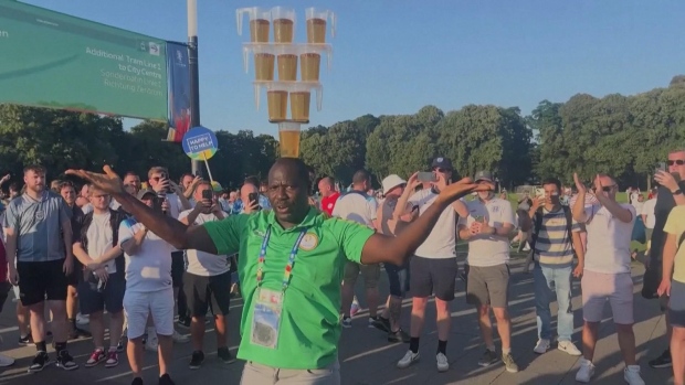 WATCH | Euro 2024 volunteer balances nine beers on his head; A man balances nine beers on his head