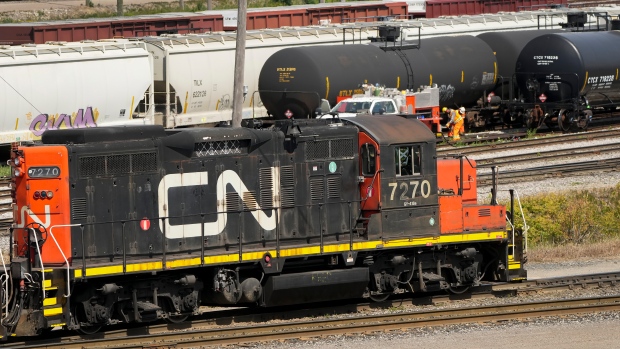 How Canada reached the brink of an unprecedented railway stoppage; Canadian National Railway Co\. says it earned \$1\.42 billion in the three months ended Dec\. 31, 2022, up from \$1\.2 billion in the fourth quarter of 2021\. CN rail trains are shown at the CN MacMillan Yard in Vaughan, Ont\., on Monday, June 20, 2022\. THE CANADIAN PRESS/Nathan Denette