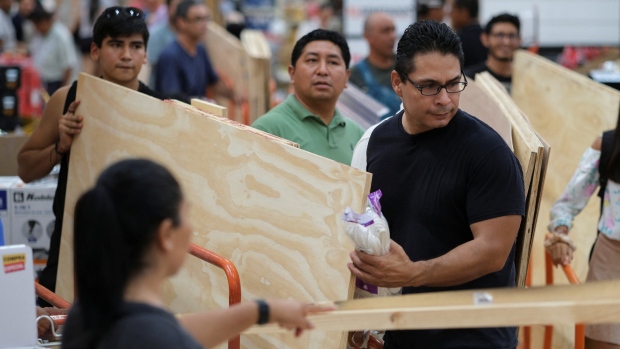 'Extremely dangerous and rare' Hurricane Beryl bearing down on Caribbean islands; People buy wood to protect their windows as they prepare ahead of the arrival of Hurricane Beryl, in Cancun, Mexico June 30, 2024\. REUTERS/Paola Chiomante