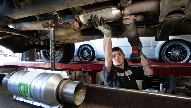 Catalytic converter thefts are dropping. It's no coincidence that metal prices are falling, too; Sam Howard, assistant manager at Master Muffler in Murray replaces a worn out catalytic converter on a vehicle on Thursday, Jan\. 20, 2022 in Salt Lake City\. Catalytic converter thefts are spiking in Utah, and some legislation is being considered to help track stolen converters\. \(Francisco Kjolseth/The Salt Lake Tribune via AP\)
